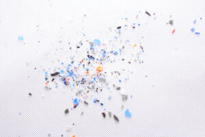 A pile of microplastics - small pieces of hard plastic, intended for further processing. Microplasts are said to settle in the human body.