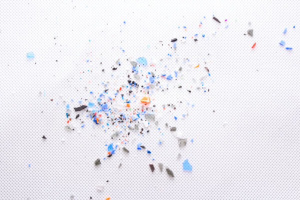 A pile of microplastics - small pieces of hard plastic, intended for further processing. Microplasts are said to settle in the human body.